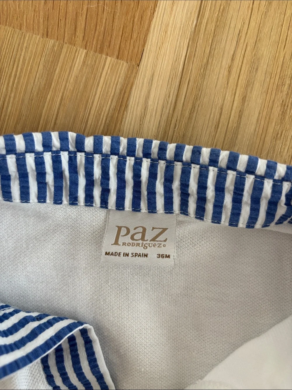 Paz Rodríguez Little Boy’s White Cotton Polo Shirt with Blue Striped Collar